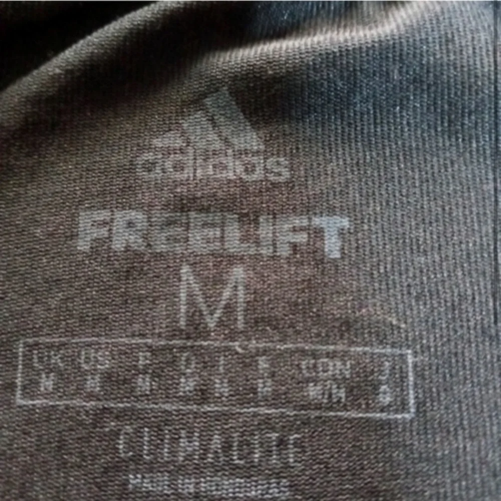 *Classic Adidas black and white t shirt in a size Medium unisex